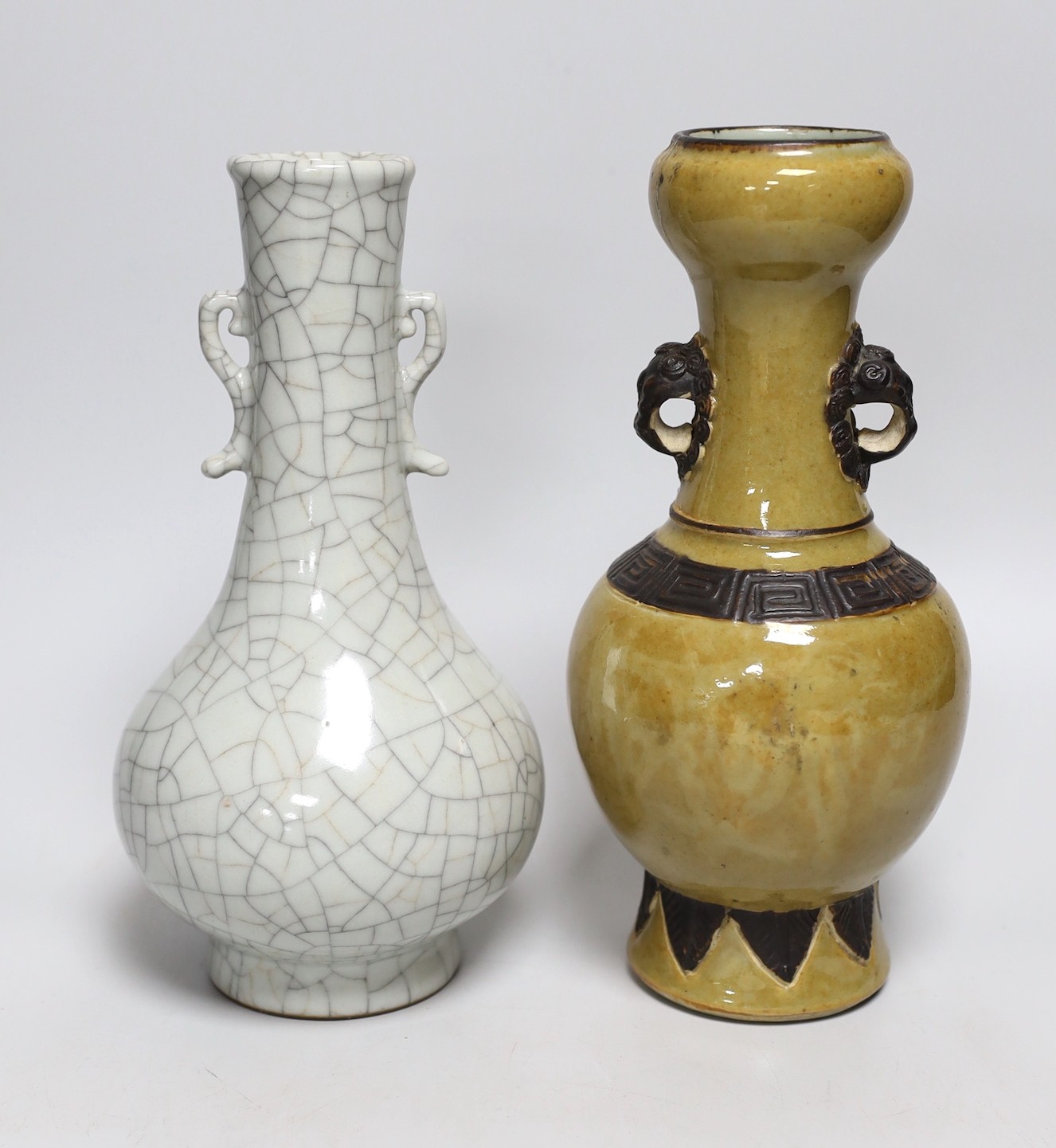 A Chinese crackle glaze vase, 24cms high and a pale brown glazed vase